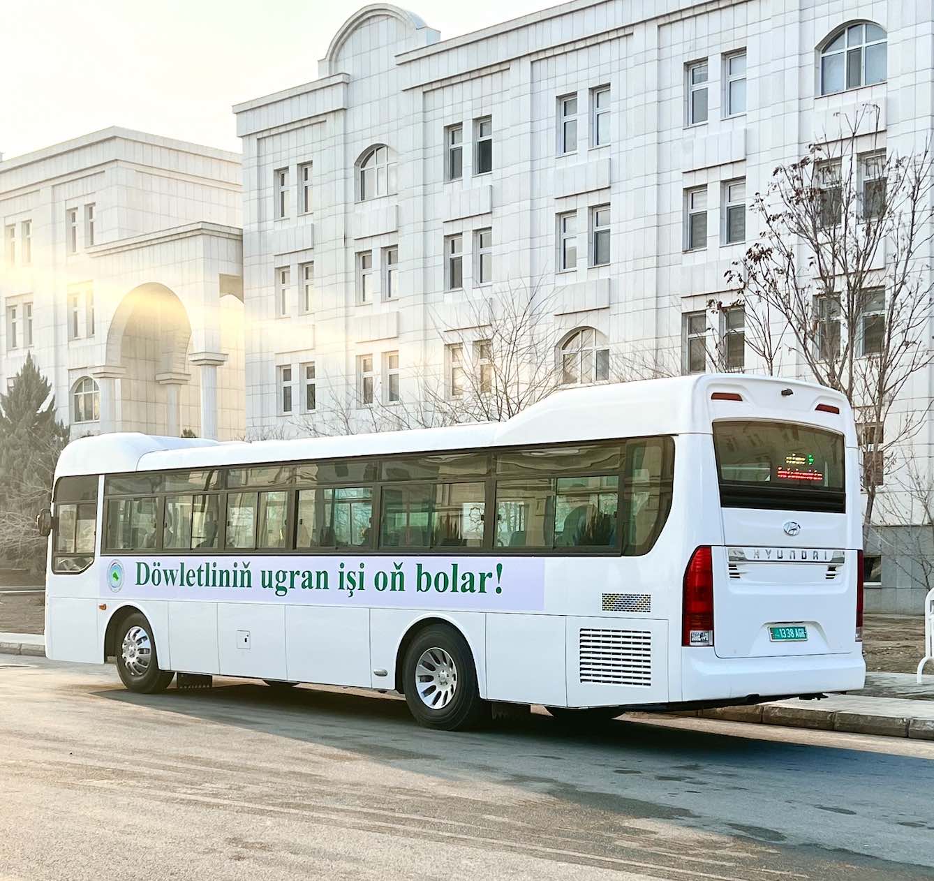 City buses decorated in honor of the upcoming meeting of the Chambers of Milli Gengesh